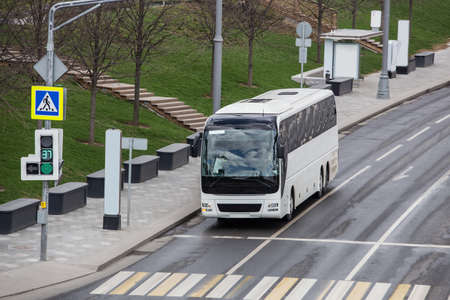 Tourist Bus on a multi-lane road. View from aboveの写真素材