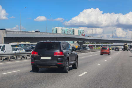 Car Traffic in the City on a Multi-lane Highway on a Summer Dayの写真素材