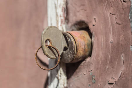 Key in the Old Door Lock Close-up, detailの写真素材