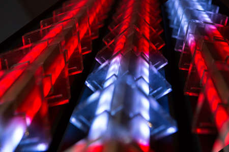 Red-blue glowing diode strips in transparent futuristic housings