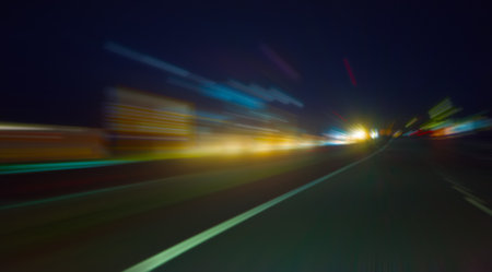 Traffic on night road with motion blur