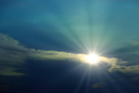 Beautiful Dark Sky With Sun And Cloudsの写真素材