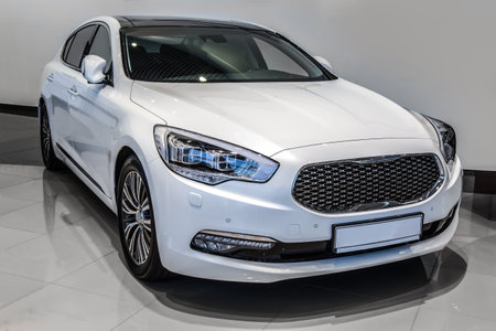 New car in auto showroom close up front viewの写真素材
