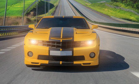 Sports Car Speeds Down the Highway. Front view.の写真素材