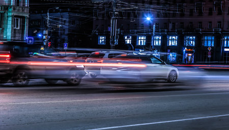 Car traffic over night city blurred motionの写真素材