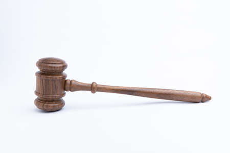 A wooden judge gavel isolated on white backgroundの写真素材