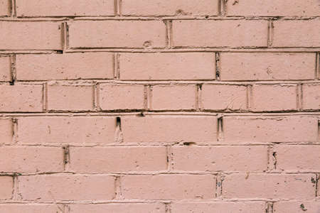 painted pink brick wall pattern background