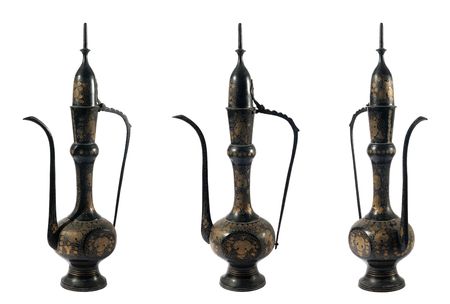 Old black metallic jug on a white background.  (isolated)の写真素材