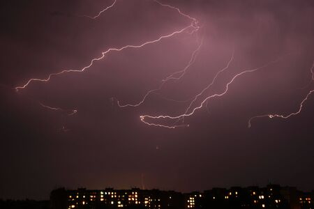 Lightning a thunderstorm, nightly cloudy skyの写真素材