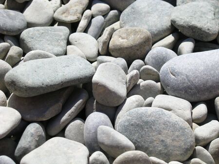 background texture of the gray sea stones