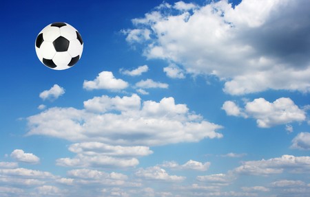 Football ball in the sky, backgroundの写真素材