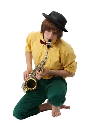 Man with a sax musical instrument on tne white backgroundの写真素材