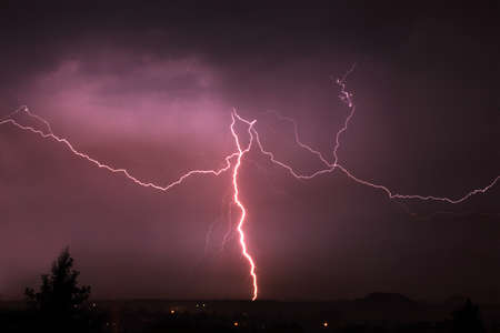 Lightning a thunderstorm, nightly cloudy sky, background