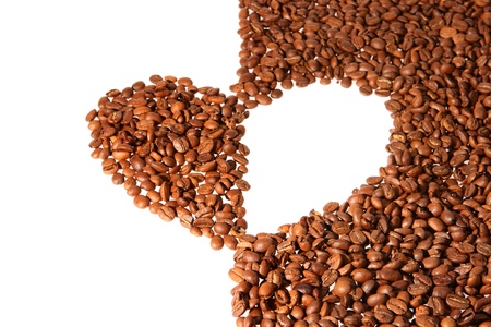 Heart from the coffee beans on the white background, to the day of Sainted Valentineの写真素材