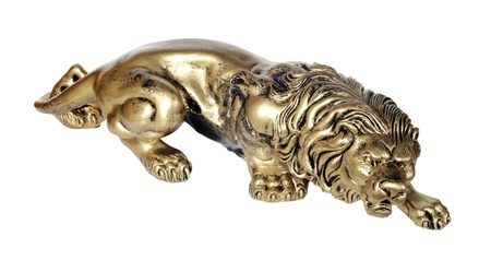 Bronze figurine of a lion on the white backgroundの写真素材