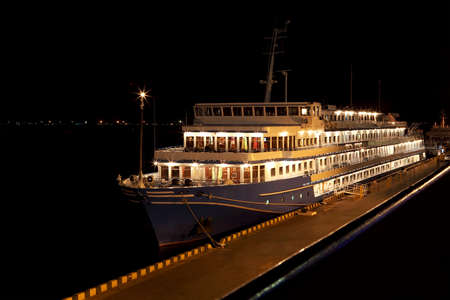 Night view of cruise ship in portの写真素材