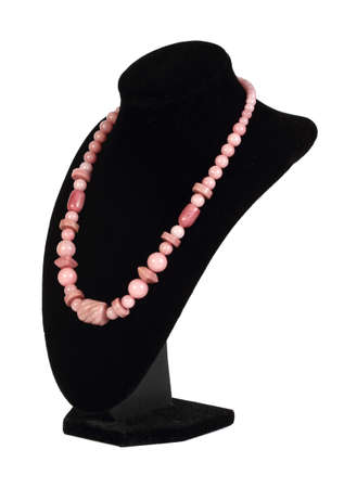 Costume bijouterie on a stand on the white background, isolatedの写真素材