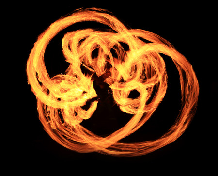 Fire show flaming trails, background.の写真素材