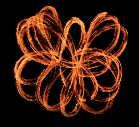 Fire show flaming trails, background.の写真素材