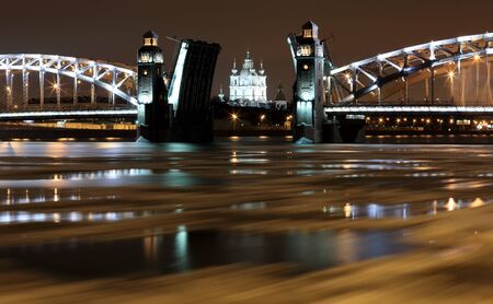 Night view of Opening Bolsheokhtinsky bridge in St. Petersburg, Russia.の写真素材