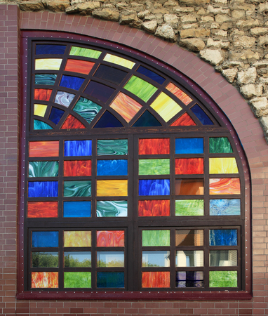 Texture of the old multi-colored stained-glass windows, background.の写真素材