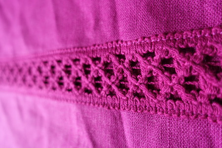Fuchsia linen fabric with stripe of crochet lace