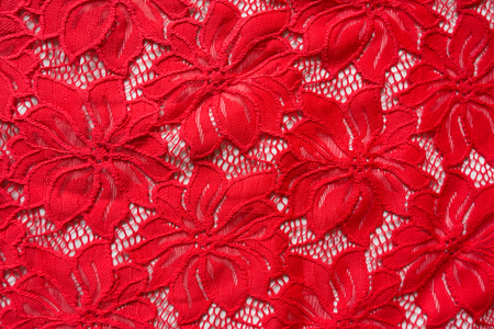 Carmine floral openwork on white background from aboveの写真素材