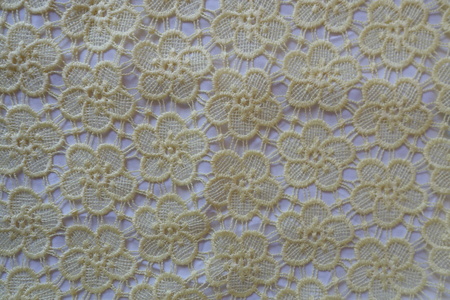 Cream colored crochet lace fabric from aboveの写真素材