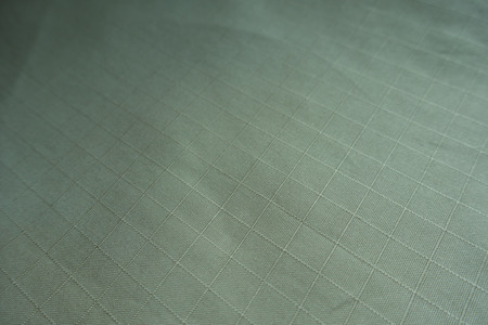 Close view of pale green cotton fabric
