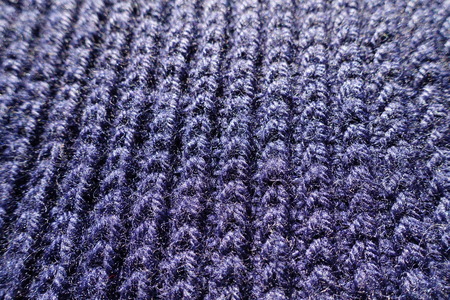 Macro of dark purple handmade knit fabricの写真素材