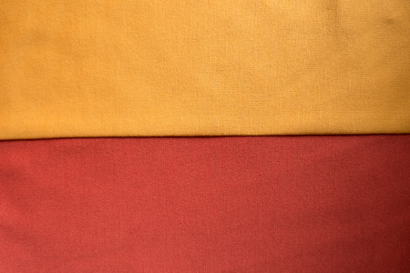 Amber yellow and orange red jersey sewn together (horizontal)の写真素材