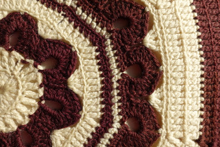 Handmade crochet fabric in auburn and white