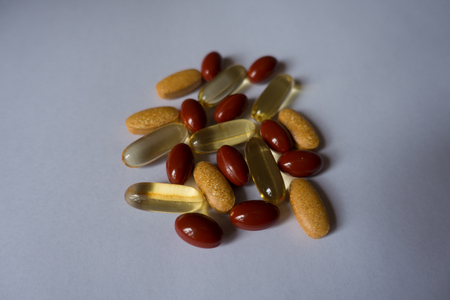Capsules of lutein, fish oil and multivitaminsの写真素材