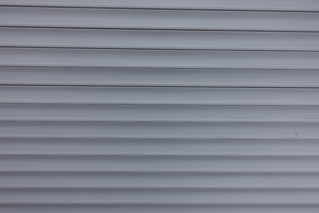 Close view of white plastic roller shutterの写真素材