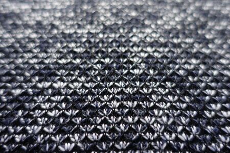 Close view of heather blue grey woolen fabric