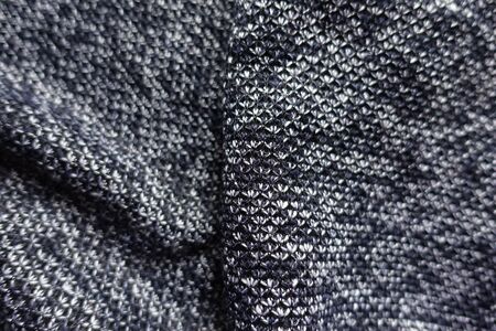 Folded thick heather blue gray fabric from above
