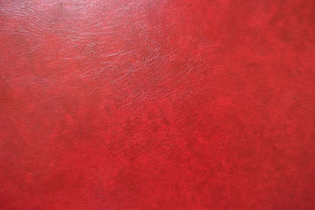 Background - bright red faux leather from above