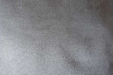Surface of simple unprinted gray fabric from above