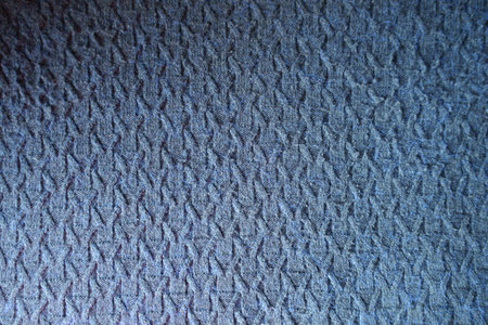 Background - navy blue knitted woolen fabric from aboveの写真素材