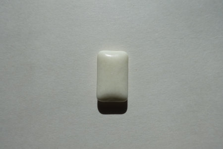 1 white rectangular piece of chewing gum from above