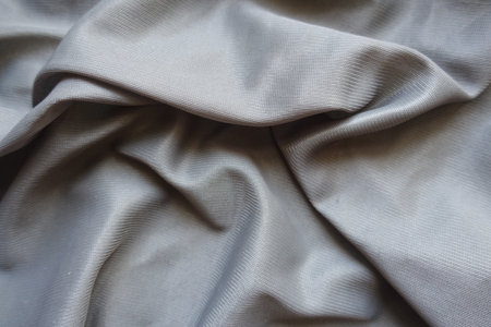 unprinted grey polyamide fabric in soft folds