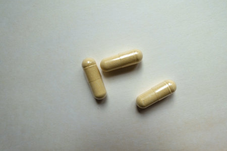 beige capsules of Saccharomyces boulardii probiotic dietary supplement (three items)