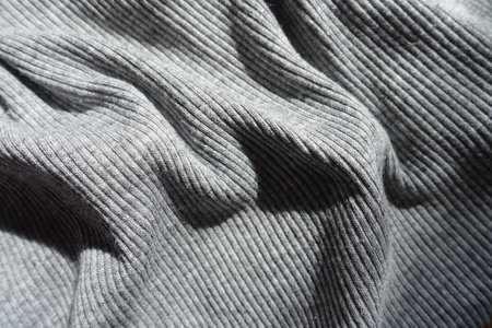 thick heather grey rib knit fabric in soft folds