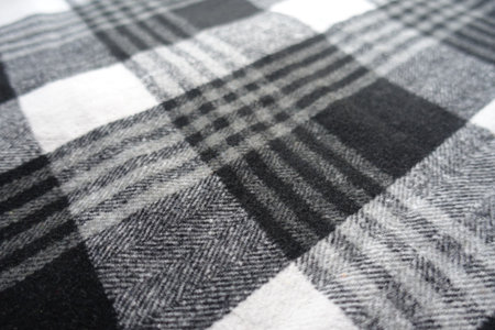Closeup of black and white cotton flannel fabric