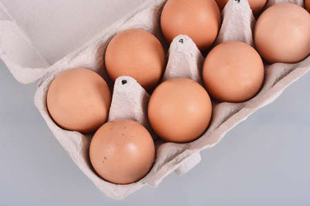 Eggs in a carton box. Isolatedの写真素材