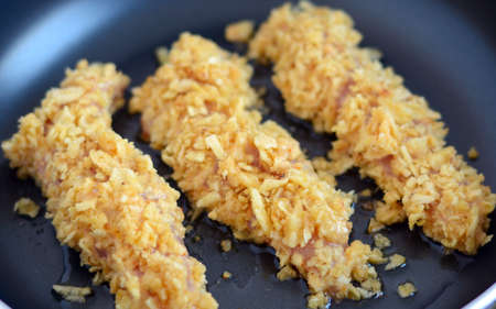 Preparing Chicken Stripsの写真素材