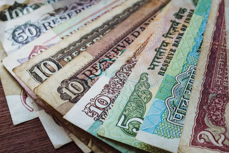 Grudge photo of old vintage notes arranged in a fan-like arrangement in closeup