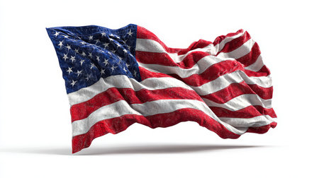 Textured american flag waving in the wind, isolated on a white background, perfect for patriotic themesの素材