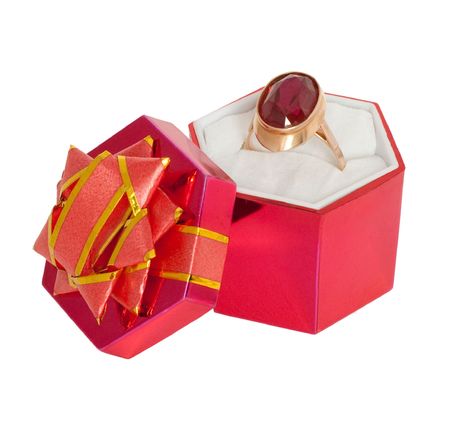 gold ring with big red ruby in gift boxの写真素材