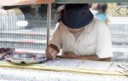 Art restorer. Grand Palace Wat Phra Kaew. Emerald Buddha Temple.のeditorial素材